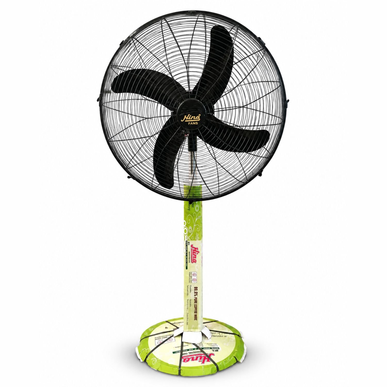 Hino black heavy duty pedestal fan with five blades standing in a garden